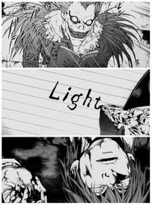 Ryuk writes Light's name in the Death Note manga